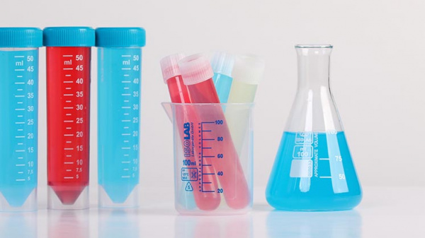 Chemical tubes and flasks containing red and blue liquids